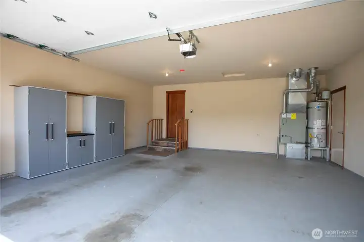 2 car garage with storage cabinets. 2 car garage with storage cabinets.