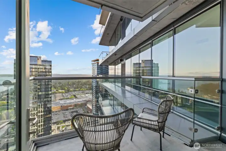 A glass door opens to your own private balcony. A glass door opens to your own private balcony.