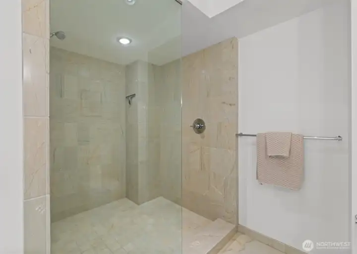 Extra roomy walk-in shower. Extra roomy walk-in shower.