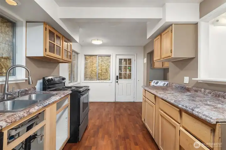 Kitchen with space for breakfast nook or dining table. Electric appliances. All appliances stay. Kitchen with space for breakfast nook or dining table. Electric appliances. All appliances stay.