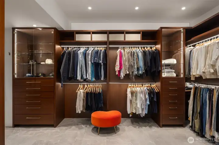 Custom walnut wood walk-in closet. Custom walnut wood walk-in closet.