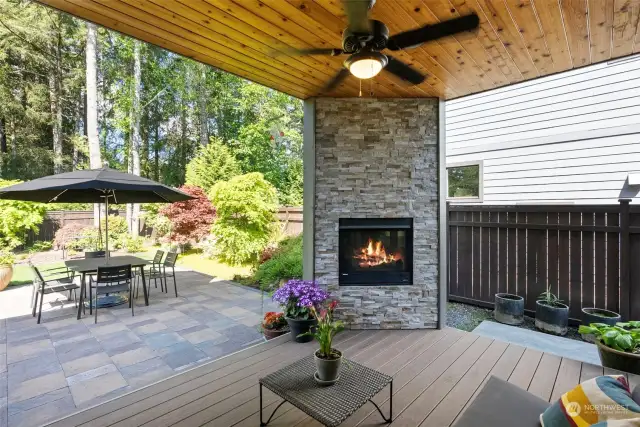 Covered Deck with gas log fireplace.