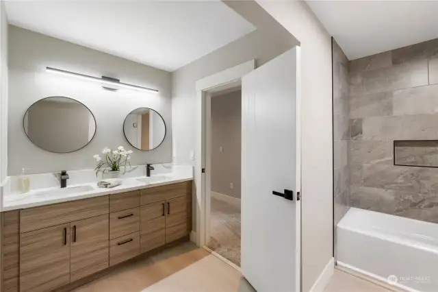 Full bathroom with two sink vanity