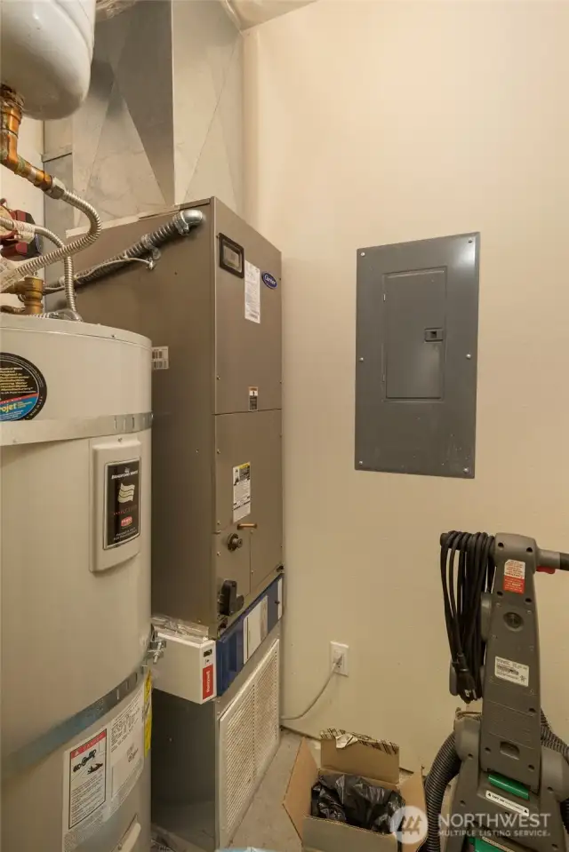 Utility room with high end water heater, forced air furnace