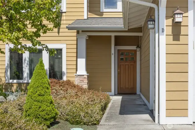 Entry to end unit on west end of complex faces south