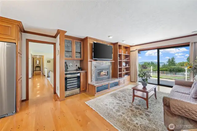 The family room features a breathtaking view of the sound and mountains.