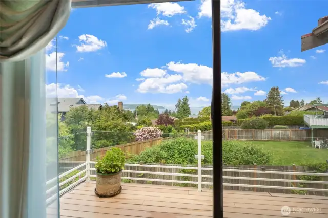 Primary features a sliding glass door to the deck.