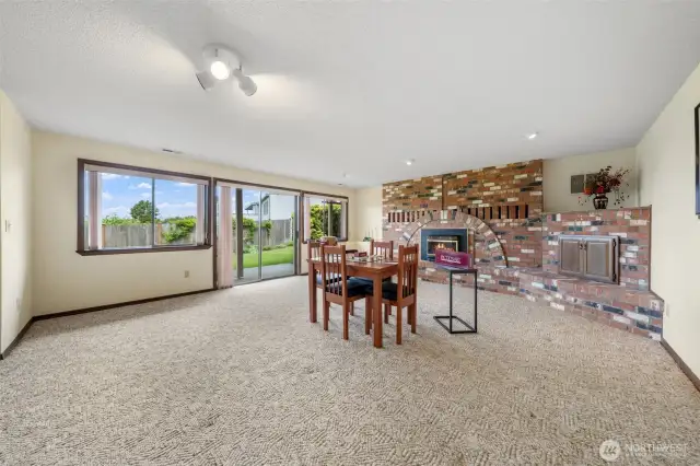 Lower level features a large recreational room with gas fireplace and slider to the backyard.