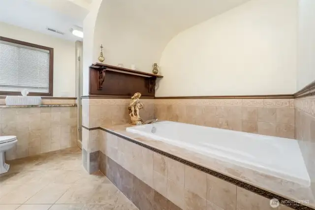 Soaking tub in second primary suite.