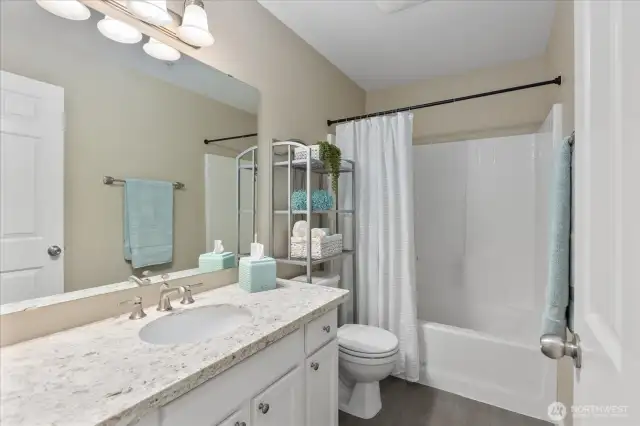 Full Bath located right next to the Bedrooms. Beautiful finish work, including fresh paint.
