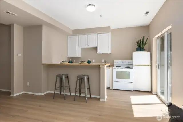Bright Lower Level with New Floors over looking the park. Private Patio Entrance to your Income Potential, MIL Unit or Flex Space!