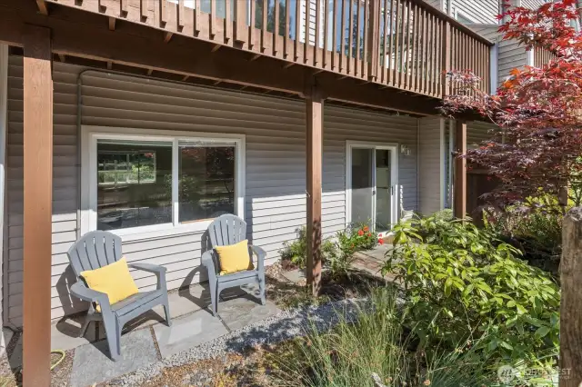 Private Patio from the lower level connects seamlessly to the park. Morning Coffee with the Birds and space for your BBQ & Hammock.