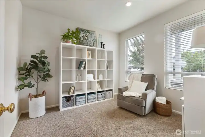 Multiple-use room right of entry.  This could make a great office, reading room, play room or nursery.