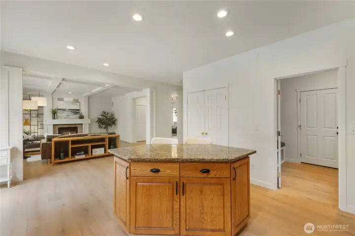 Open concept from kitchen to family room.  Mud room is to the right.
