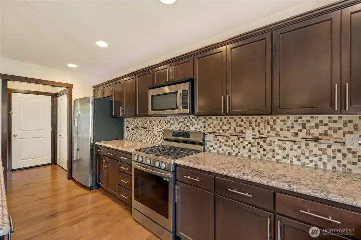 Kitchen 3 towards pantry & garage