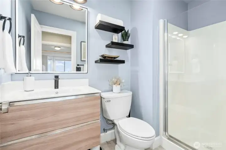 Main floor 3/4 bath next to the 2nd bedroom