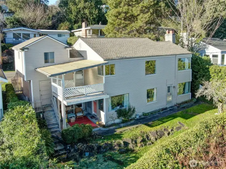 This is the back of the home, which faces the lake. 50 year composition roof.