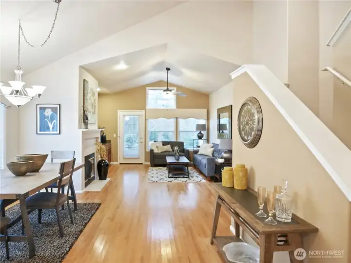 Soaring ceilings, oak hardwood floors, and an open floorplan well suited to entertaining and comfortable daily life.