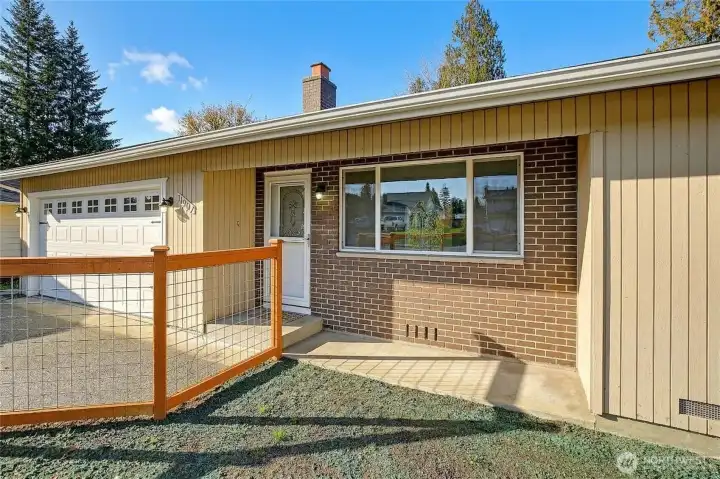 This home is fully fenced in the front and partially fenced in the back.
