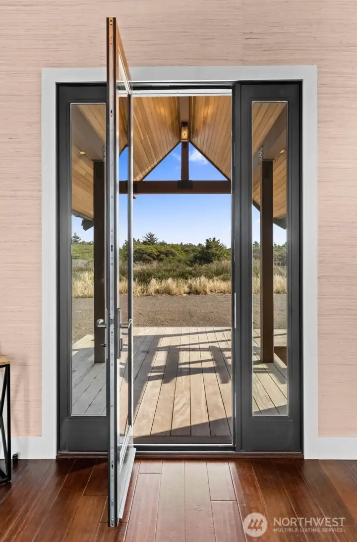 Architecturally a masterpiece with premium quality Cali solid bamboo flooring inside and over 1400 SqFt of Brazillian Teak Cumaru decking outside