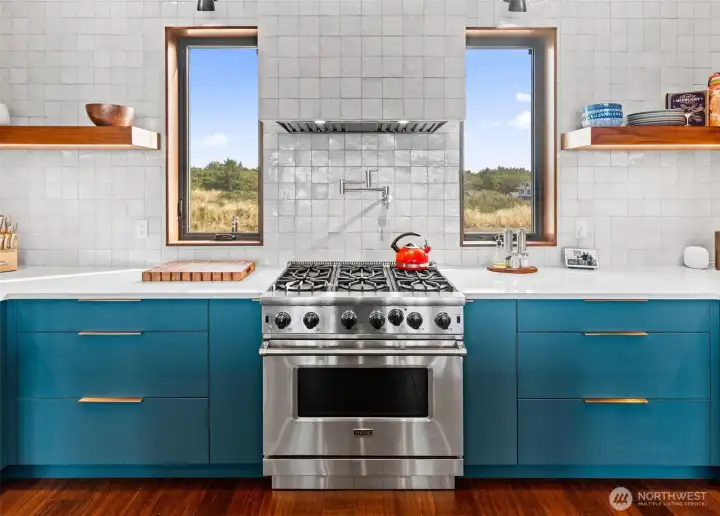 Handmade Italian tile from counter to high ceiling