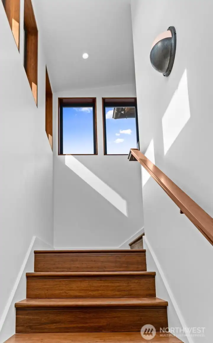 Primary suite enjoys the entire 2nd level