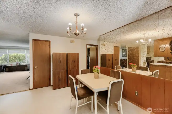 The dining room is located conveniently between the living room and bonus room.