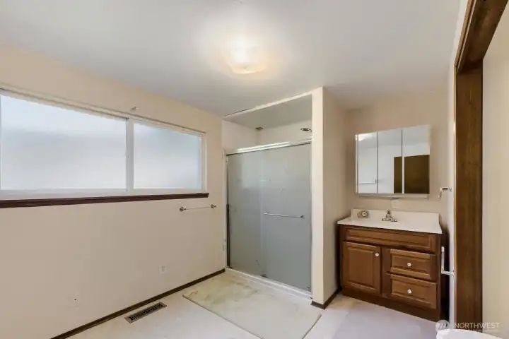 Primary bath is newer and enormous; ready for your design ideas.