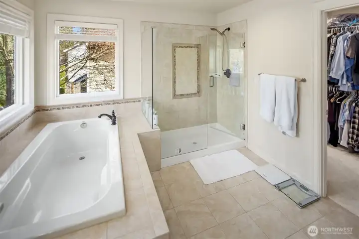 Nice Master Bathroom with Big Bath Tub & Separate Tiled Shower w/ Seamless Glass Enclosure, and  Private toilet room