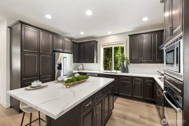 The large cabinets to the left serve as the pantry.