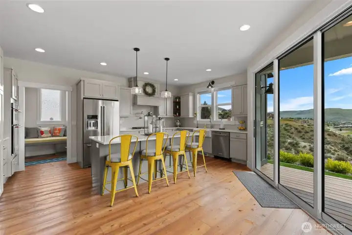 Kitchen eating bar and large glass doors