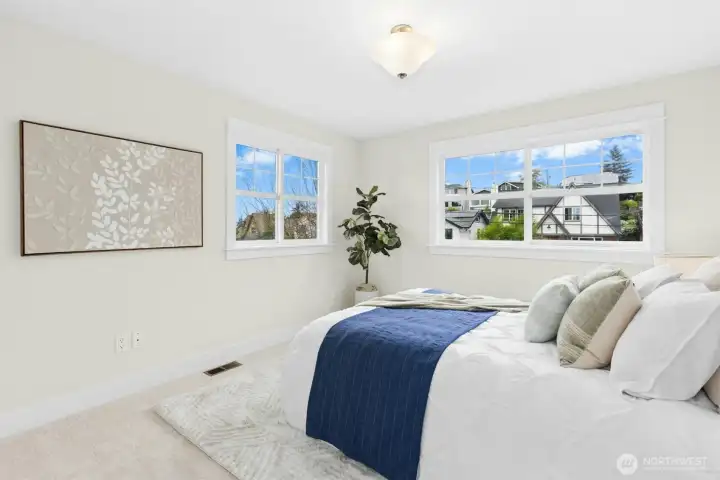 3rd upstairs bedroom, easily a nice choice for home office, too, but so is lower level.