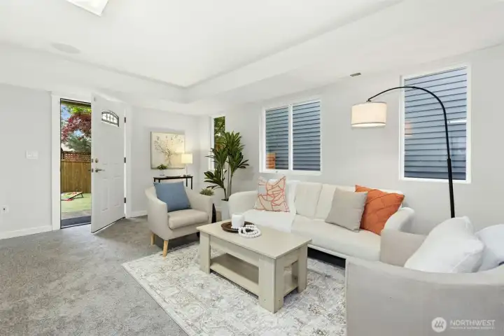 The lower-level family room fills with light and would be tremendous home office.
