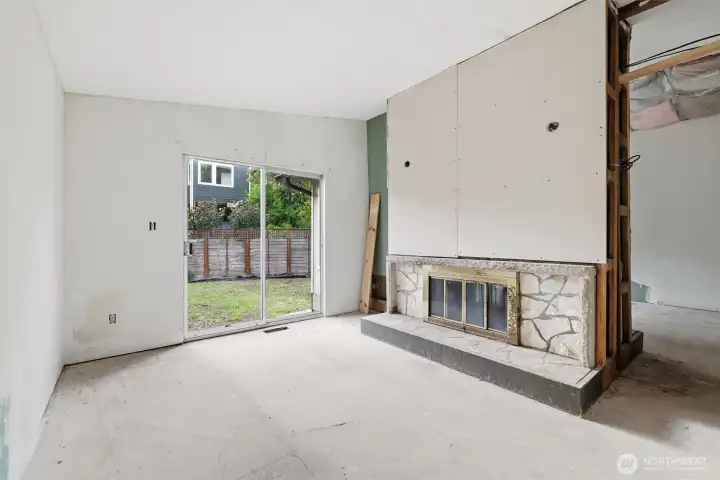 The other side of the living room is a formal dining room. Imagine a deck off the slider for easy access to the backyard.