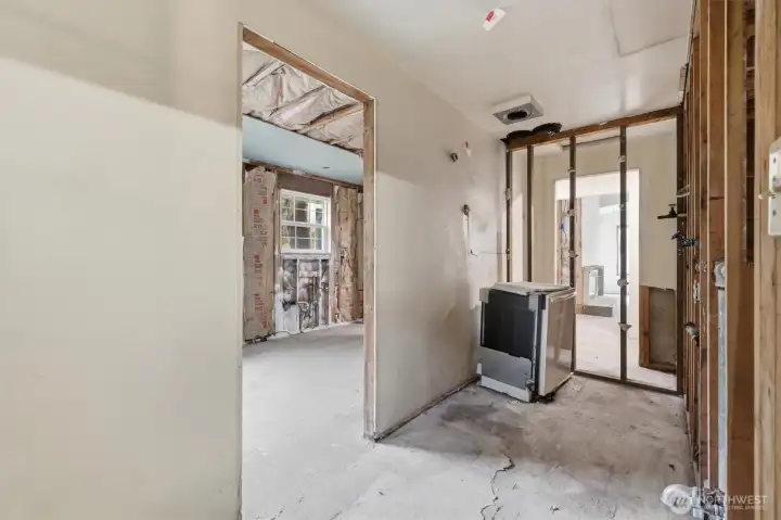 Currently mud room space between garage and kitchen.