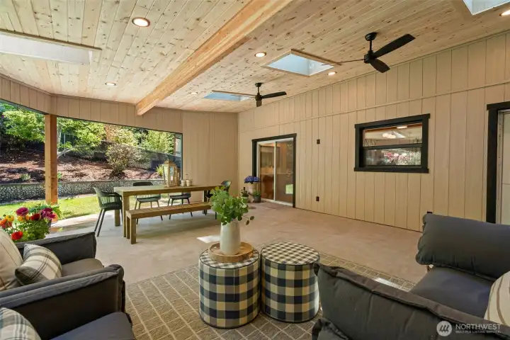 Off the kitchen you can access the 700 sqft, covered, outdoor patio.