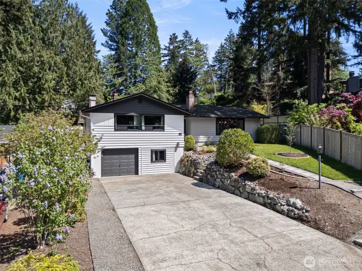 The garage has an additional room/flex space perfect for hobbies or additional storage.