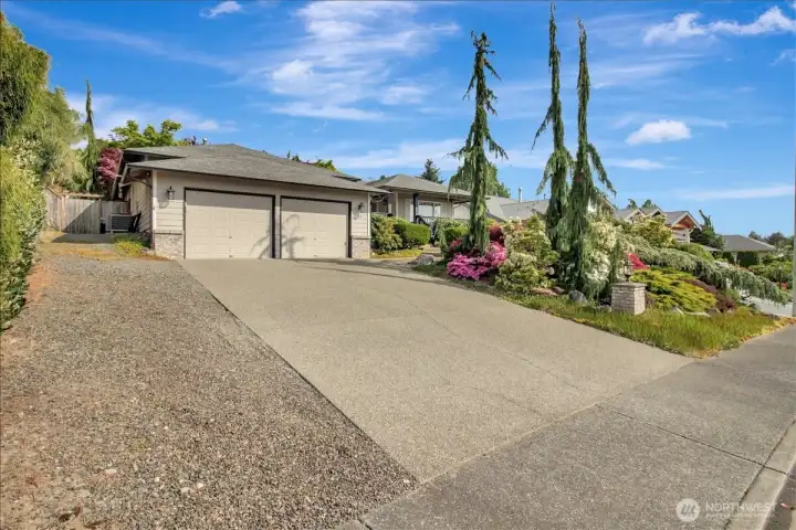 2 car garage with additional parking space