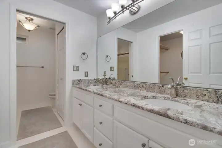 Dual sinks in primary and walk in closet