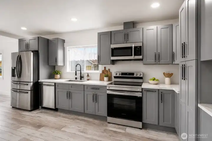 Fully remodeled kitchen!  All the items on the countertops were virtually staged.