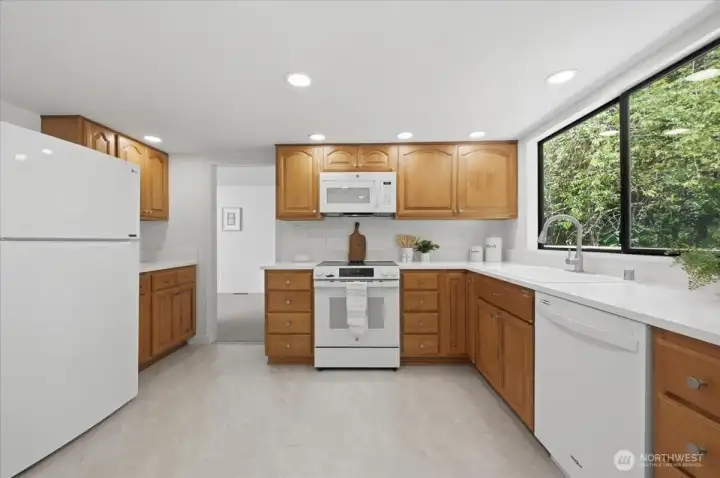 All new LED recessed lighting with adjustable color temperature. Kitchen appliance stay with the home.