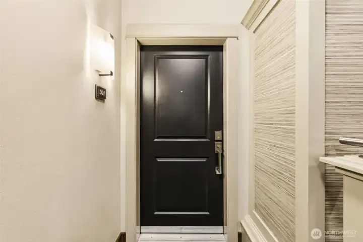 Front Door to condo walking from the elevator to the unit Front Door to condo walking from the elevator to the unit