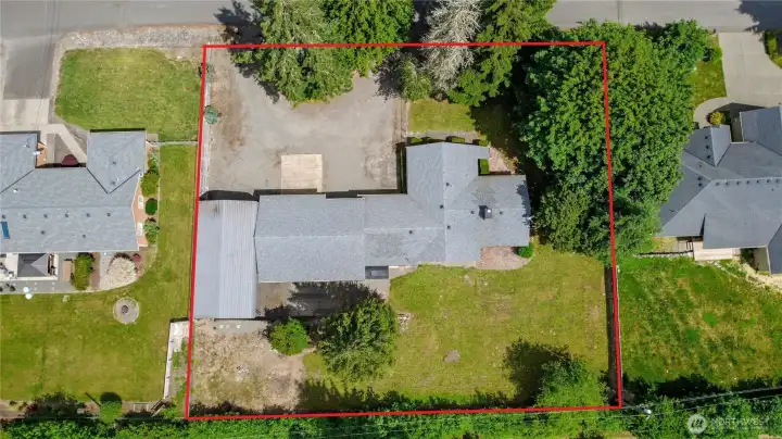 A pull-through circular driveway provide easy access, ample parking and convenient maneuvering for trailers and RV's.