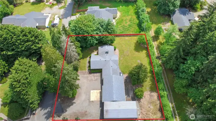 A pull-through circular driveway provide easy access, ample parking and convenient maneuvering for trailers and RV's.