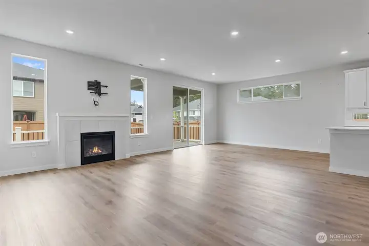 Spacious, warm, and phenomenally bright  great room even has a gaslog fireplace