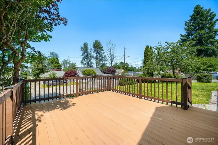 Enjoy effortless indoor-outdoor living on this newly built Trex deck overlooking the fully fenced yard. The spacious design offers plenty of room for morning coffee, afternoon reading, or weekend gatherings surrounded by greenery. With durable low-maintenance materials and open views of the neighborhood, this inviting outdoor retreat perfectly extends the home’s living space into the sunshine. Enjoy effortless indoor-outdoor living on this newly built Trex deck overlooking the fully fenced yard. The spacious design offers plenty of room for morning coffee, afternoon reading, or weekend gatherings surrounded by greenery. With durable low-maintenance materials and open views of the neighborhood, this inviting outdoor retreat perfectly extends the home’s living space into the sunshine.