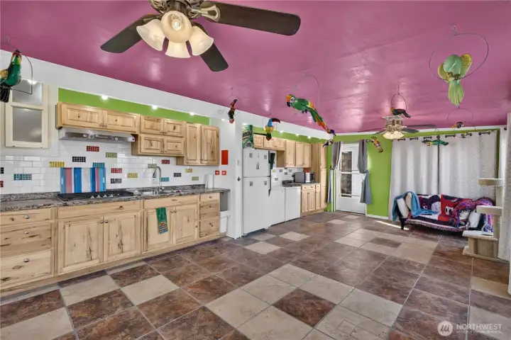 Enclosed Patio with Propane cooktop, fridge, and 2 freezers Enclosed Patio with Propane cooktop, fridge, and 2 freezers