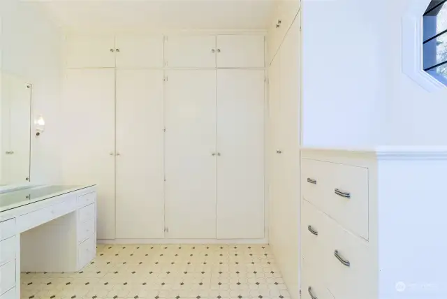 Ample closet space, drawers and a convenient vanity
