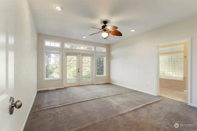 Primary bedroom on the mail level with a spacious walk-in closet.