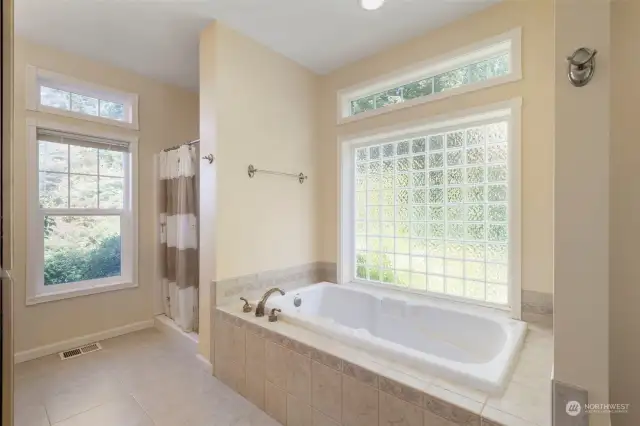 Spacious jetted tub in the primary suite.